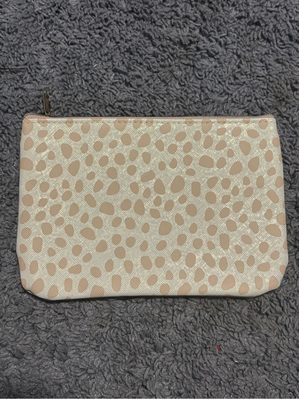 NWOT white glittery pouch with cream splotches scattered around
